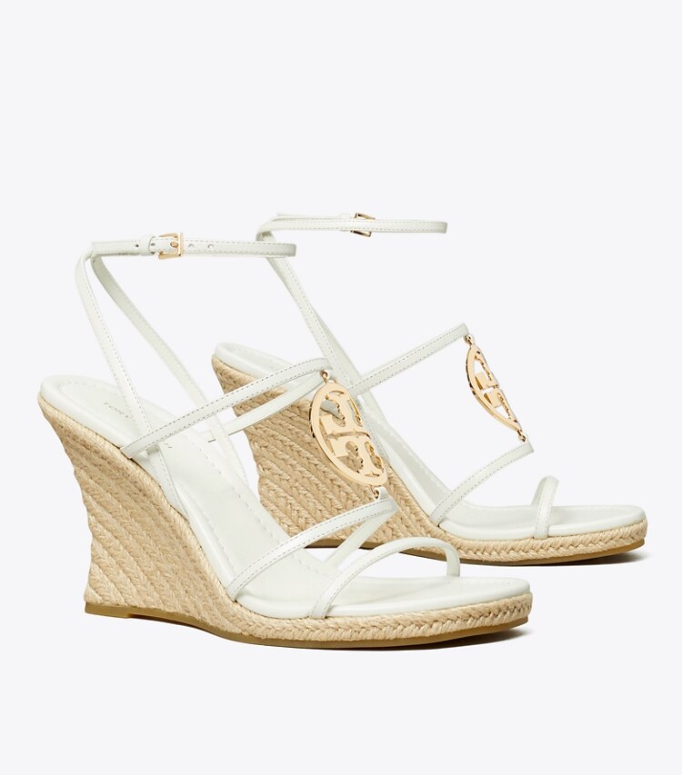 Tory Burch designer espadrilles Miller Capri Espadrille à talon compensé dans CREAM / GOLD angle