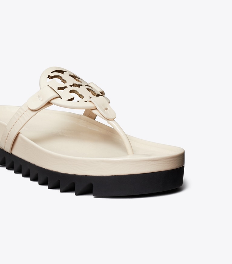Tory Burch designer sandals Miller Cloud Lug Sandal in NEW CREAM / PERFECT BLACK angle