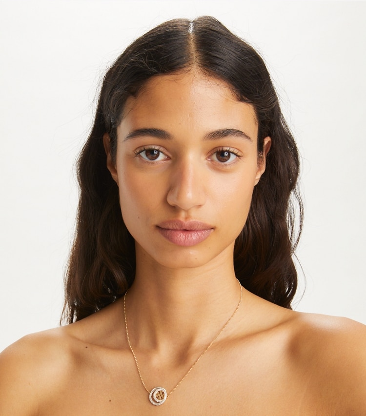Tory Burch designer necklaces Miller Double Ring Pendant in Tory Gold / Crystal accessory on model