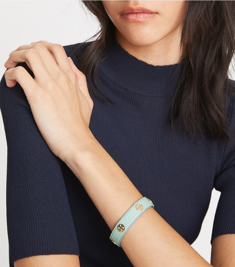 Tory Burch designer bracelets Miller Leather Bracelet in Tory Gold / Sea Bubble accessory on model