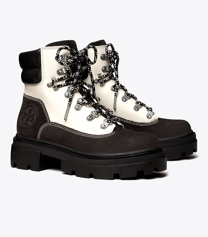 Arriba 77+ imagen tory burch black and white boots