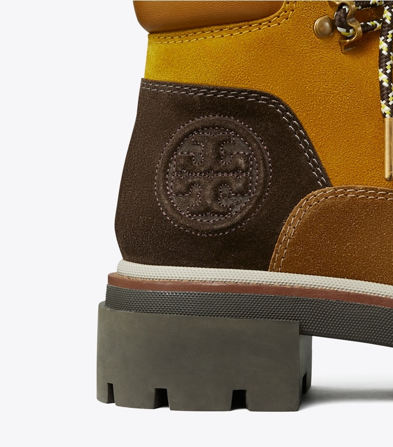 Tory Burch designer ankle boots Miller Lug Hiker Boot in WHEAT / RHUM / BROWN angle