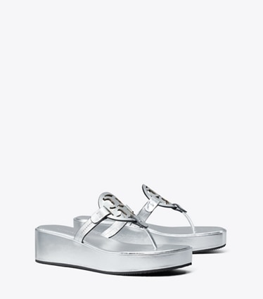 Tory Burch designer sandals Miller Metallic Wedge Sandal in Silver angle