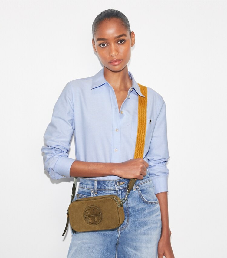 Tory Burch designer crossbody bags Miller Mini Suede Crossbody Bag in Deep Olive accessory on model
