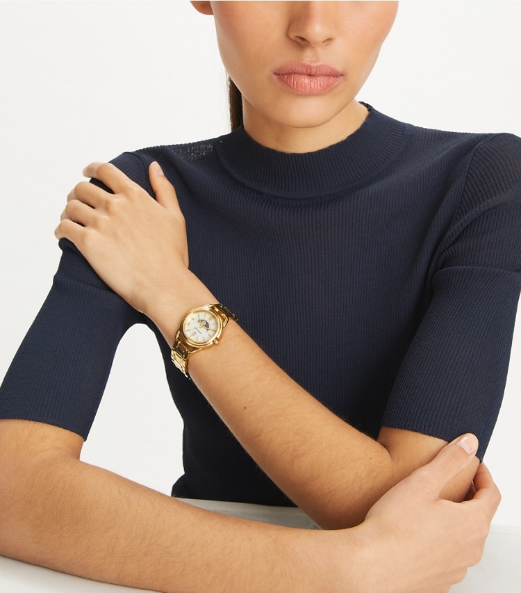 Tory Burch designer strap watches Miller Moon Watch in WHITE MOP/GOLD accessory on model