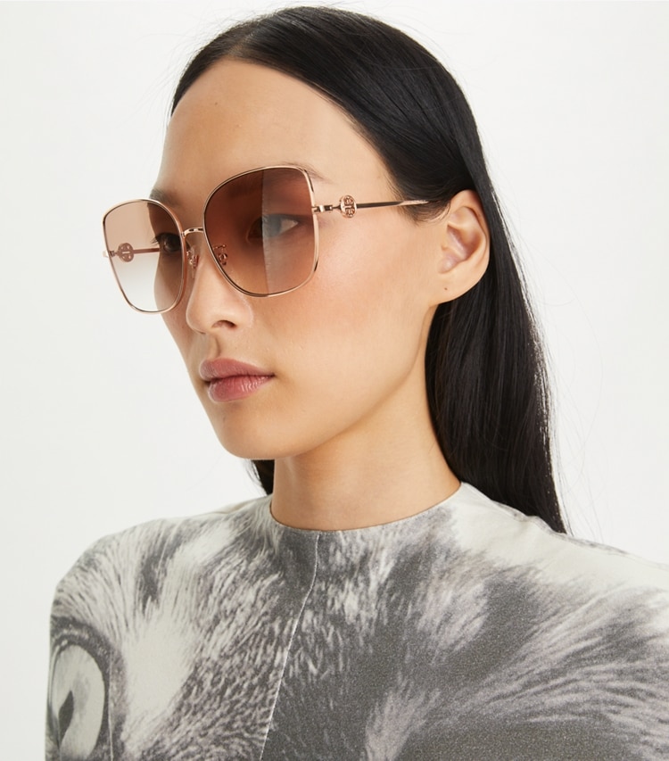Tory Burch designer sunglasses & eyewear Miller Oversized Metal Butterfly Sunglasses in ROSE GOLD/LIGHT BROWN GRADIENT accessory on model