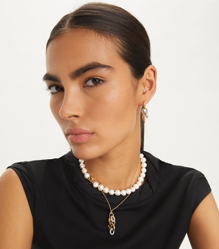 Tory Burch designer necklaces Miller Pavé Interlocking Pendant in Tory Gold / Crystal front