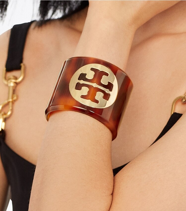 Tory Burch designer bracelets Miller Resin Cuff in Tory Gold/Red Tortoise accessory on model