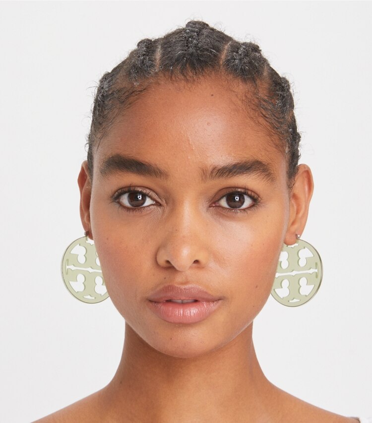 Tory Burch designer earrings Miller Resin Hoop Earring in Tory Silver / Green accessory on model