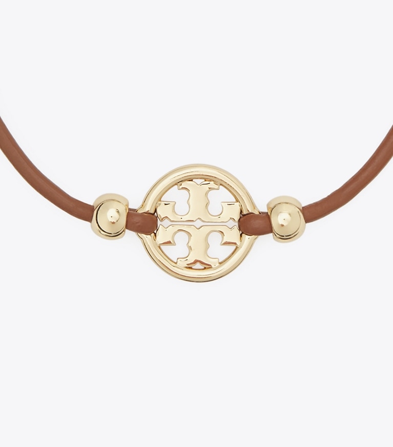 Tory Burch designer bracelets Miller Slider Bracelet in Tory Gold / Cuoio front