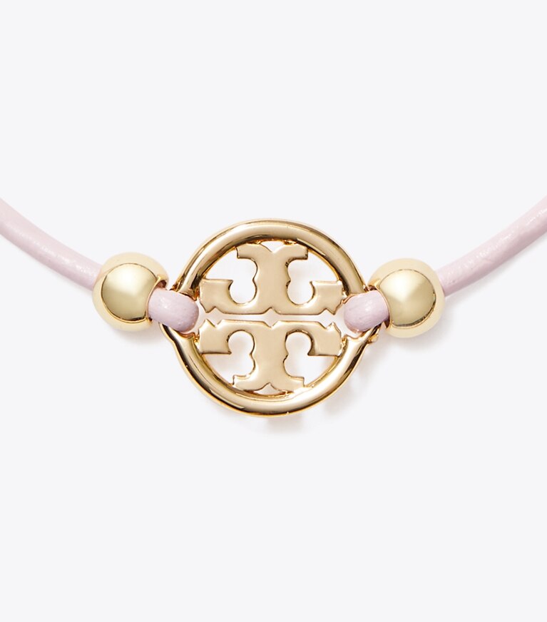 Tory Burch designer ブレスレット ミラー スライダー ブレスレット in Tory Gold / Pink front