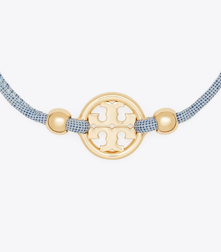 Tory Burch designer bracelets Miller Slider Bracelet in Tory Gold / Ciel front