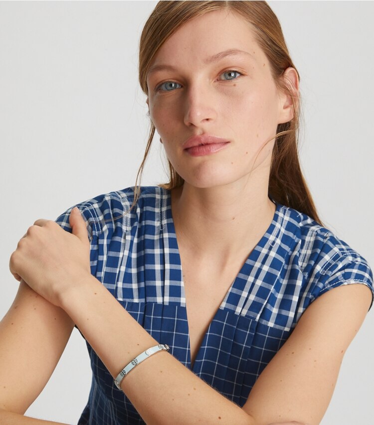 Tory Burch designer bracelets Miller Stud 5mm Enamel Hinge Bracelet in Tory Gold / New Ivory accessory on model