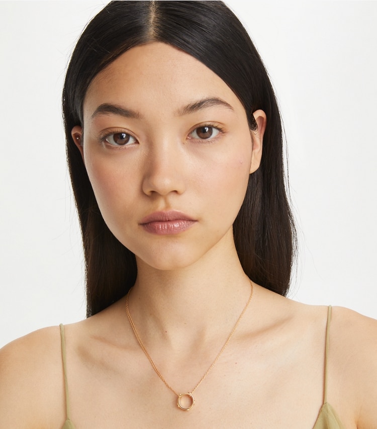 Tory Burch designer necklaces Miller Stud Circle Pendant in Tory Gold accessory on model