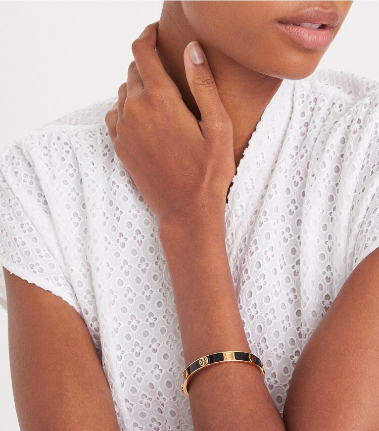Tory Burch designer bracelets Miller Stud Enamel Hinge Bracelet in Tory Gold / Black accessory on model