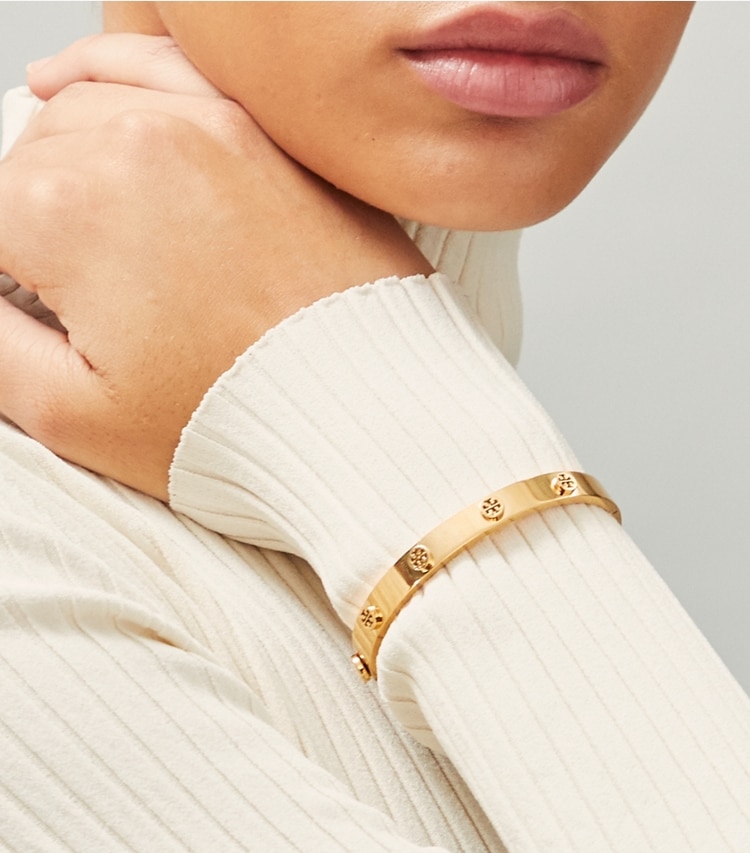Tory Burch designer bracelets Miller Stud Hinge Bracelet in Rose Gold accessory on model