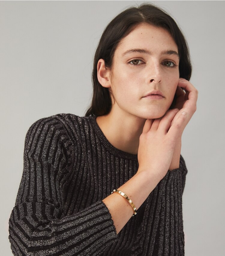 Tory Burch designer bracelets Miller Stud Pearl 5mm Hinge Bracelet in Tory Gold / Ivory Pearl accessory on model