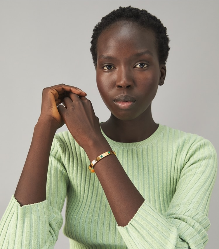Tory Burch designer bracelets Miller Stud Semi-Precious Hinge Bracelet in Tory Gold / Malachite accessory on model