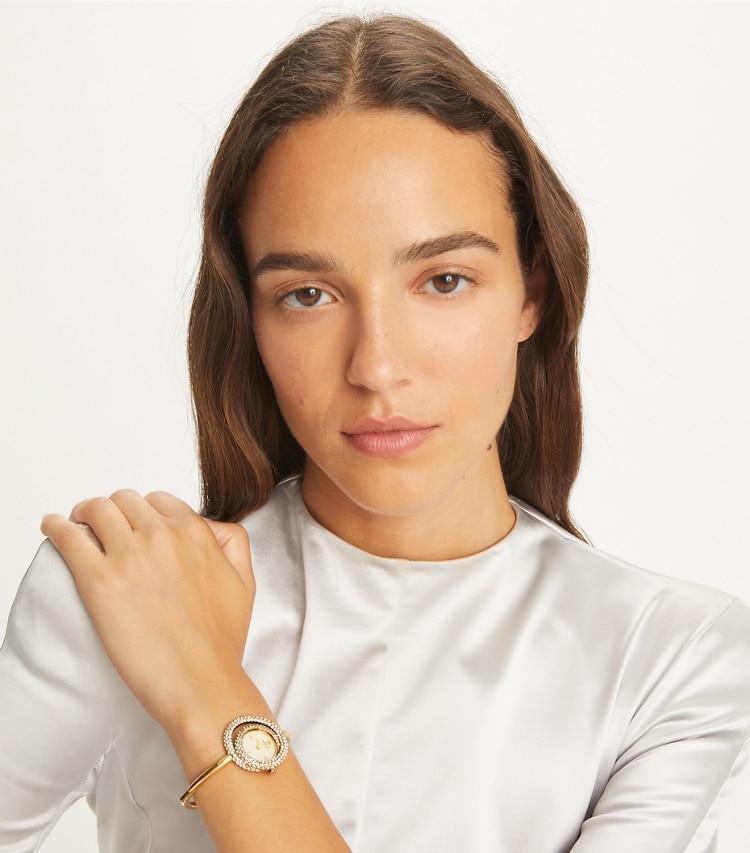 Tory Burch designer strap watches Miller Swirl Watch in IVORY/STONES/GOLD accessory on model