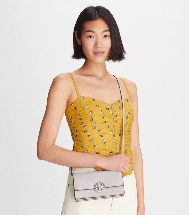 Tory Burch designer mini bags Miller Wallet Crossbody in Bay Gray accessory on model