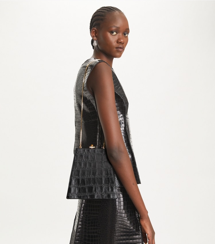 Tory Burch designer crossbody bags Mini Bag mit Krokoprägung in Black accessory on model