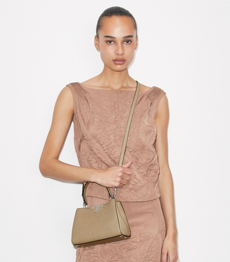 Tory Burch designer borse a spalla Mini bauletto Eleanor con rilievo a coccodrillo in Ginger Leaf additional on model