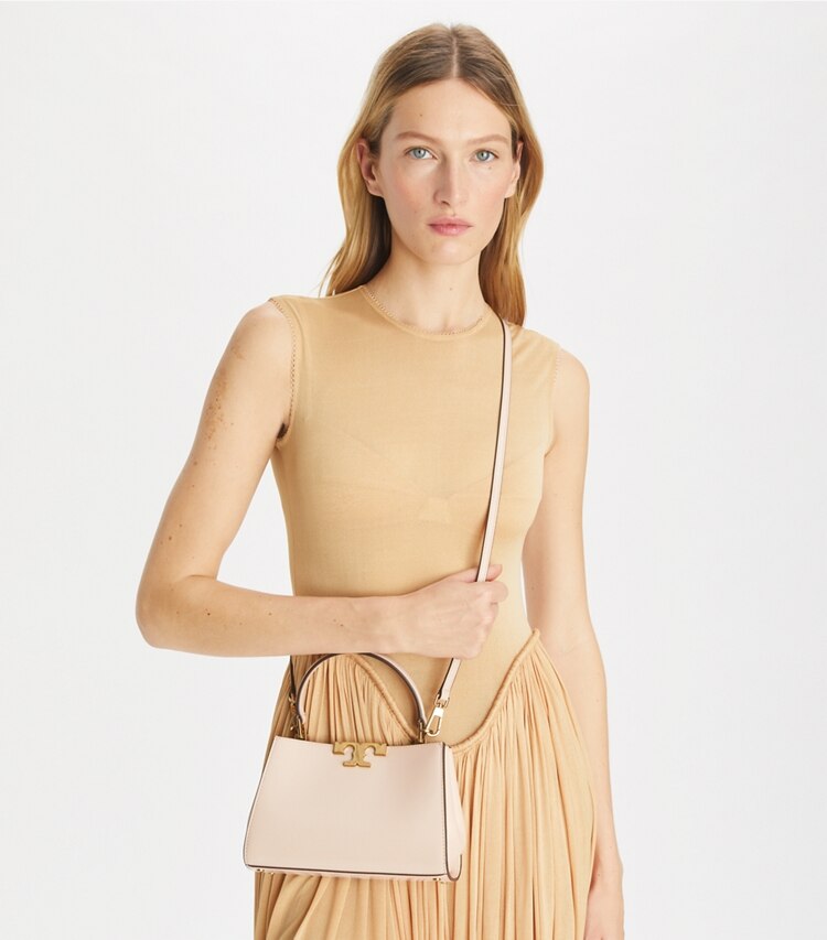 Tory Burch designer borse a spalla Mini bauletto Eleanor in pelle spazzolata in Rose Pink additional on model