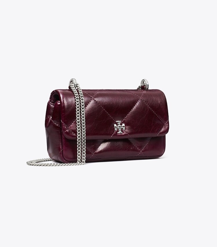 Tory Burch designer borse a spalla Mini borsa Kira con pattina e trapuntatura a diamante effetto consumato in Dark Carmine angle