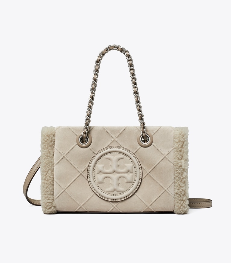 Tory Burch designer sacs à bandoulière Mini cabas Fleming en daim et shearling à chaînette in Cotton Grey front