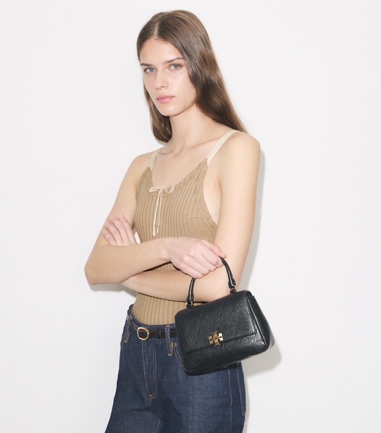 Tory Burch designer crossbody bags Mini Charlie Quilted Top-Handle Crossbody in Black additional on model