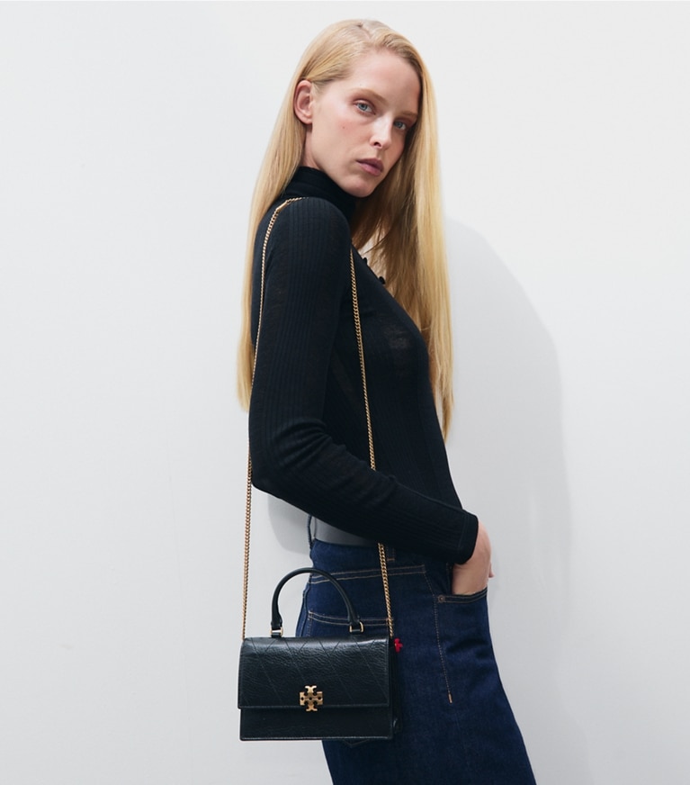 Tory Burch designer crossbody bags Mini Charlie Quilted Top-Handle Crossbody in BLACK additional on model