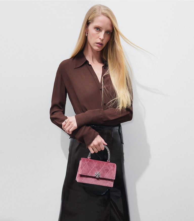 Tory Burch designer crossbody bags Mini Charlie Quilted Velvet Pavé Top-Handle Crossbody in Desert Flower additional on model