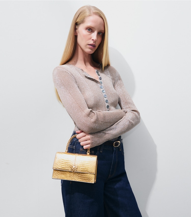 Tory Burch designer crossbody bags Mini Charlie Snake Top-Handle Crossbody in Gold additional on model