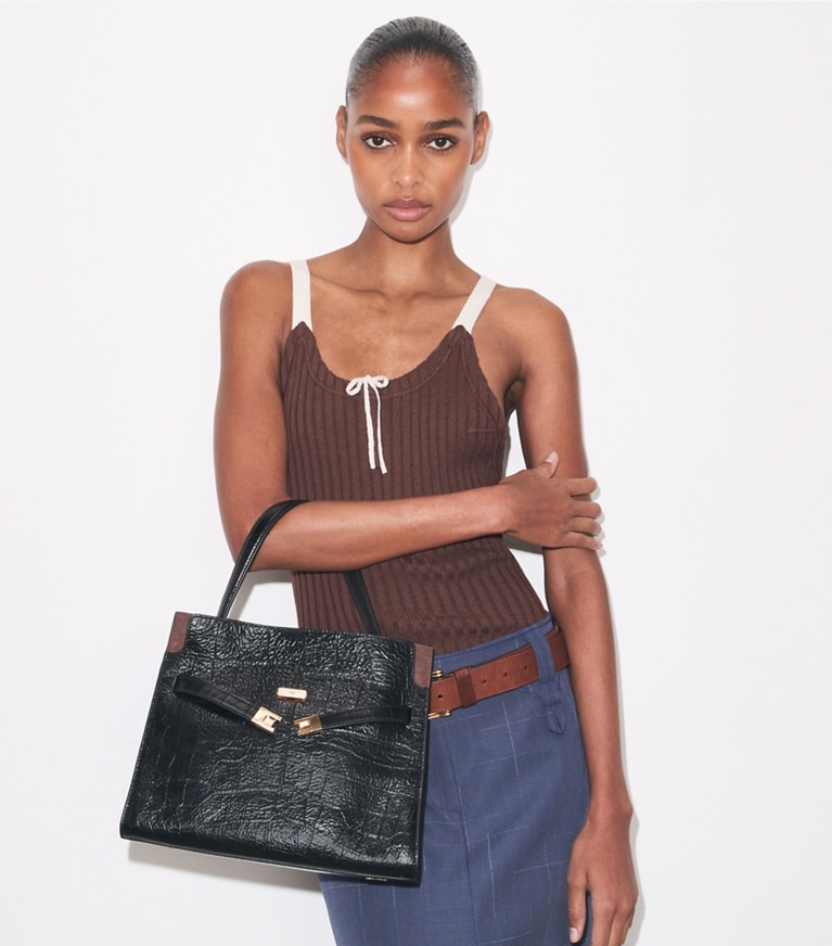 Tory Burch designer bauletto Mini double bag Lee Radziwill con rilievo in Black accessory on model