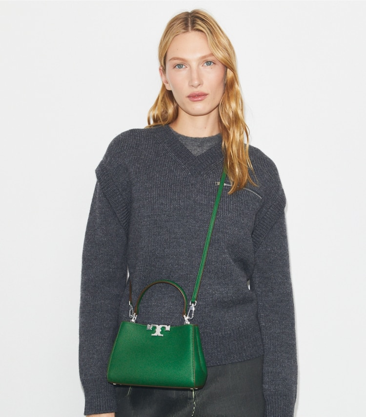 Tory Burch designer crossbody bags Mini Eleanor Soft Satchel in Dark Kale accessory on model