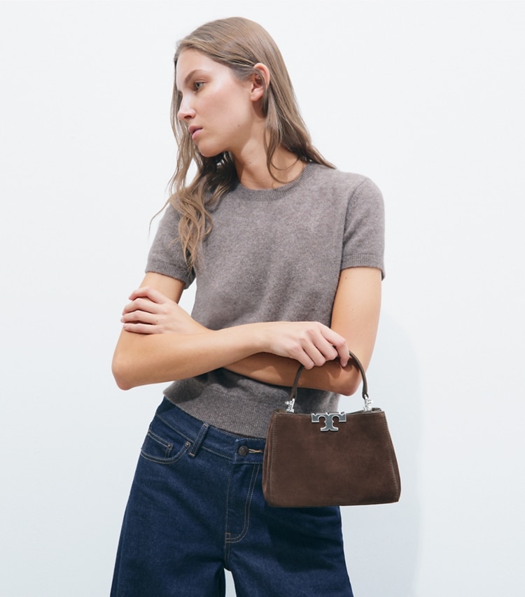 Tory Burch designer クロスボディバッグ エレノア スエード ミニ サッチェルバッグ in Dark Cocoa accessory on model