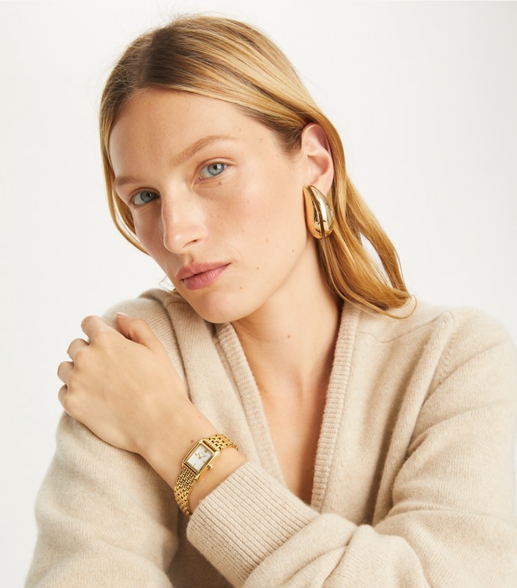 Tory Burch designer strap watches Mini Eleanor Watch in WHITE MOP/GOLD accessory on model
