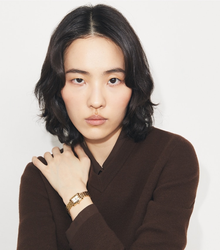 Tory Burch designer strap watches Mini Eleanor Watch in IVORY/GOLD accessory on model