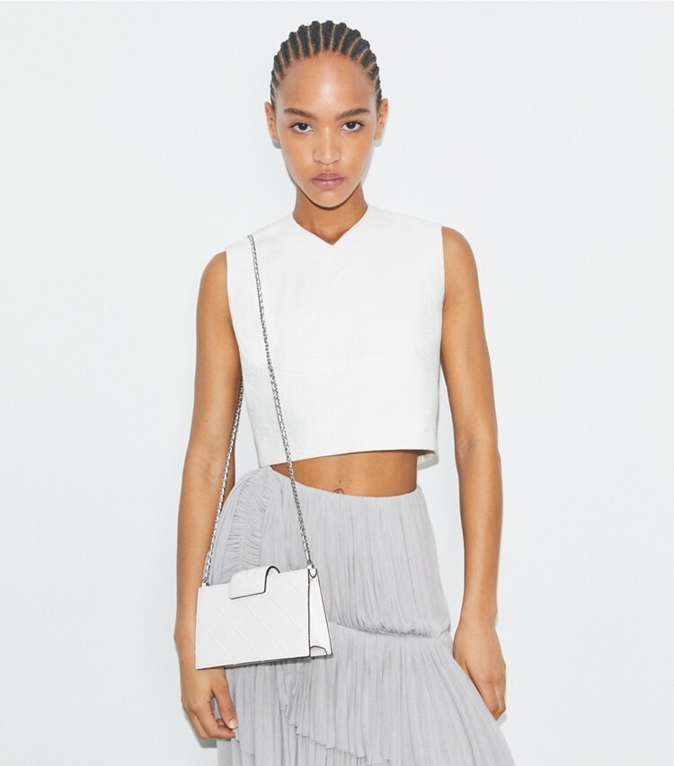 Tory Burch designer mini bags Mini Fleming Crossbody in Blanc accessory on model