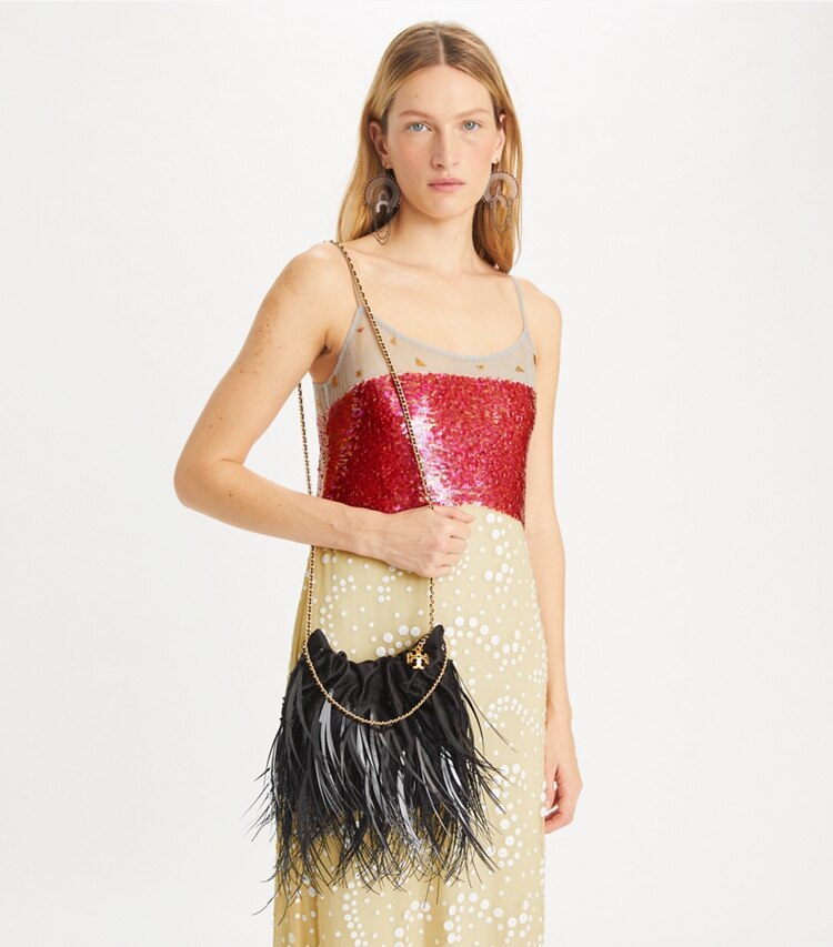 Tory Burch designer crossbody bags Mini Fleming Feather Hobo Bag in Black accessory on model