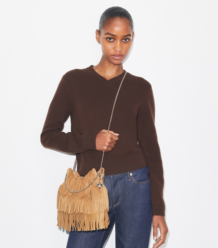 Tory Burch designer crossbody bags Mini Fleming Fringe Hobo Bag in WILD TABACCO accessory on model