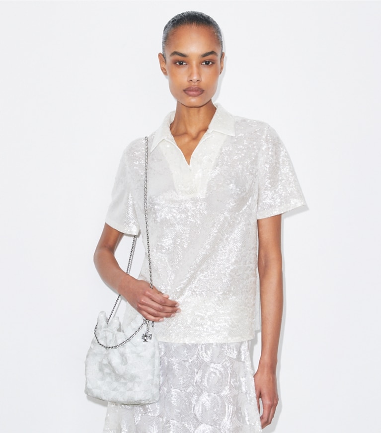 Tory Burch designer crossbody bags Mini Fleming Hobo Bag mit Pailletten in White accessory on model