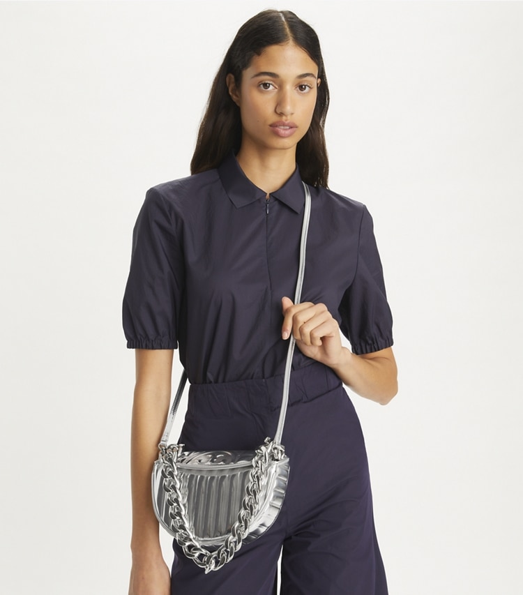 Tory Burch designer shoulder bags Mini Fleming Metallic Quilt Crescent Bag in Silver additional on model