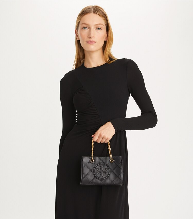 Tory Burch designer crossbody bags Mini Fleming Soft Chain Tote in Black accessory on model