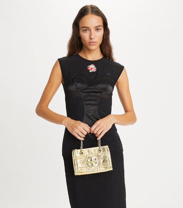 Tory Burch designer crossbody bags Mini Fleming Soft Chain Tote in 18 Kt Gold additional on model