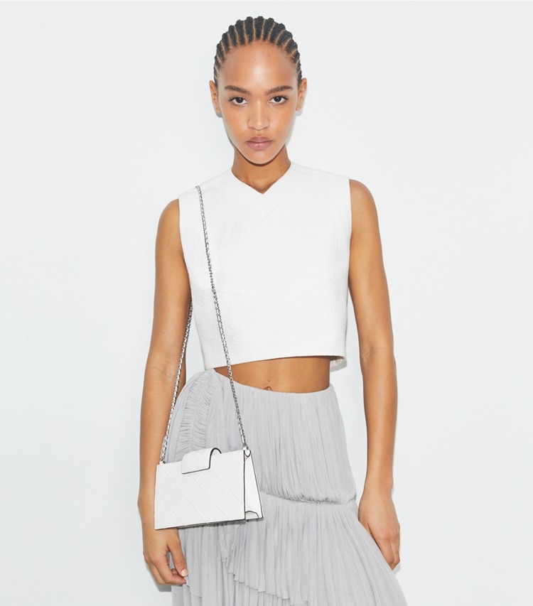 Tory Burch designer mini bags Mini Fleming Soft Chain Wallet in Blanc accessory on model