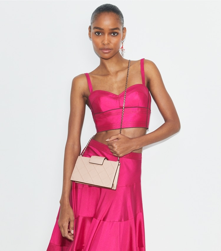 Tory Burch designer mini bags Mini Fleming Soft Crossbody in Soft Pink accessory on model