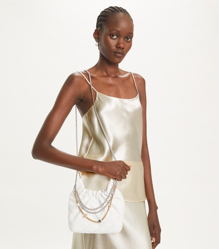 Tory Burch designer crossbody bags Mini Fleming Soft Distressed Hobo Bag in Blanc angle