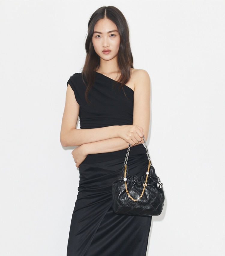 Tory Burch designer crossbody bags Mini Fleming Soft Distressed Hobo Bag in Black additional on model