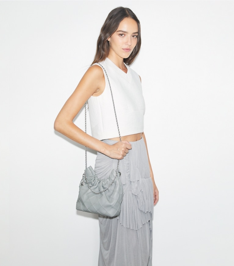Tory Burch designer クロスボディバッグ フレミング ソフト ミニ ホーボーバッグ in Gray angle